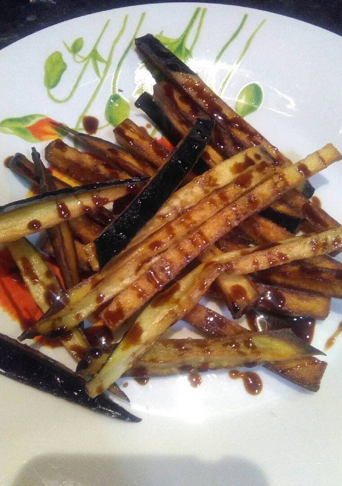 Una foto de Berenjenas fritas con miel de caña