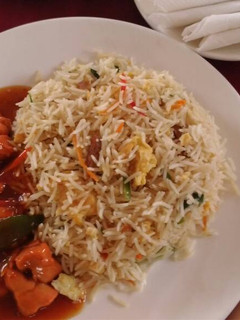 A picture of Basmati rice with sauce.