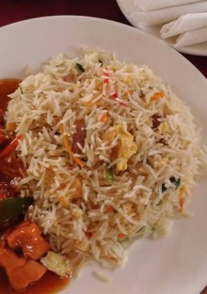 A picture of Basmati rice with sauce.