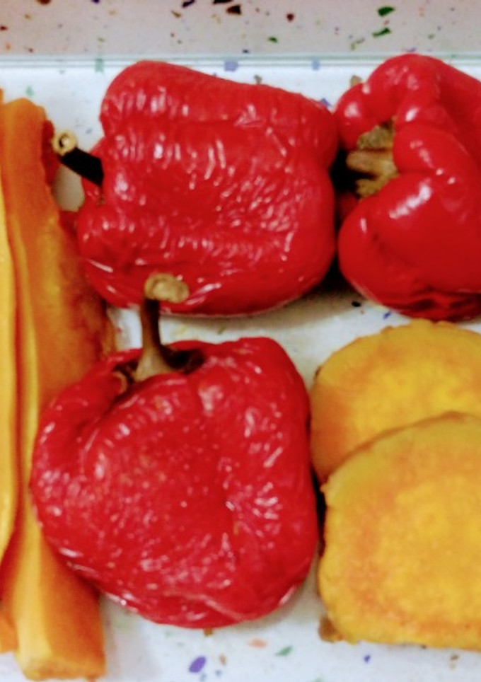 Una foto de Asado de calabaza, batata y pimientos