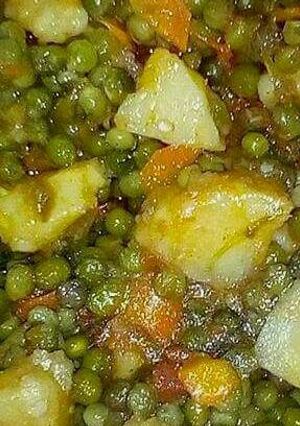 A picture of Irish potatoes with peas.