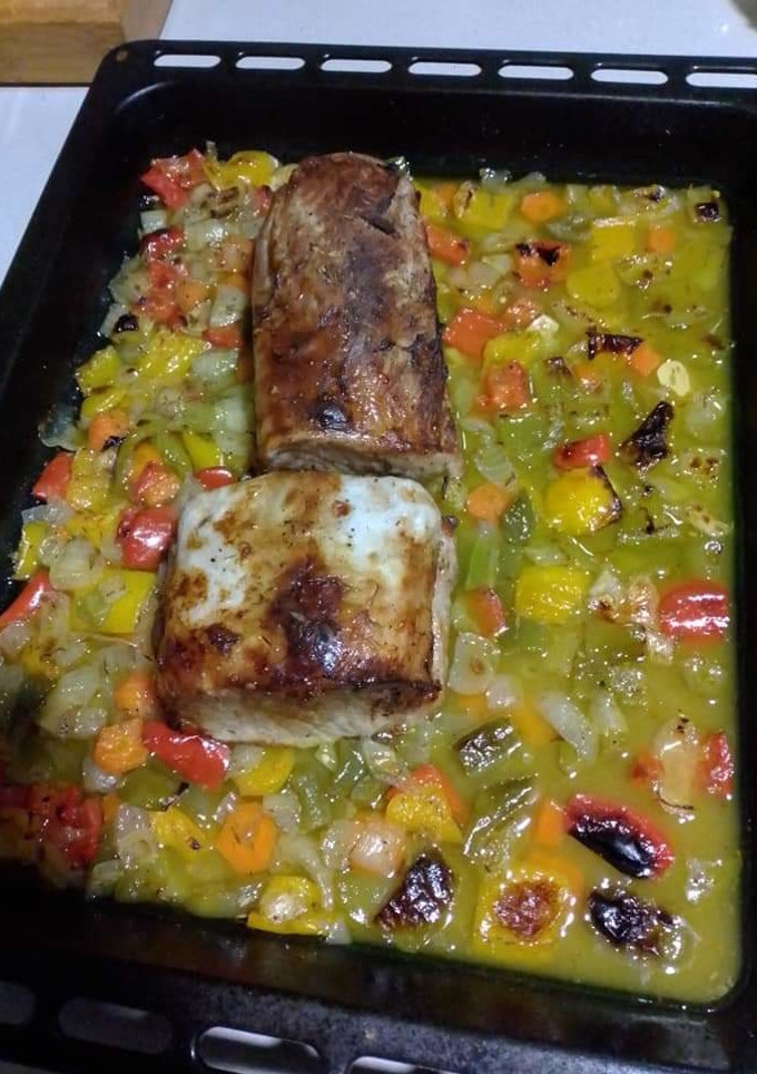 Una foto de Lomo de cerdo al horno con salsa