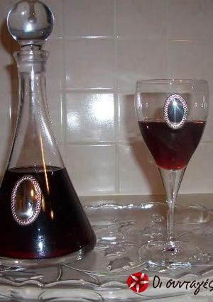 A picture of Homemade pomegranate liqueur.