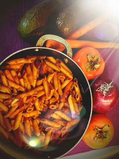 A picture of Red sauce penne pasta.