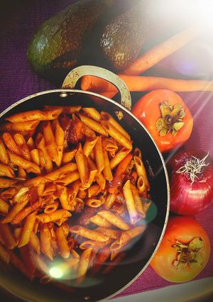 A picture of Red sauce penne pasta.