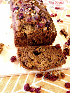 A picture of Eggless Walnut Date Cake.