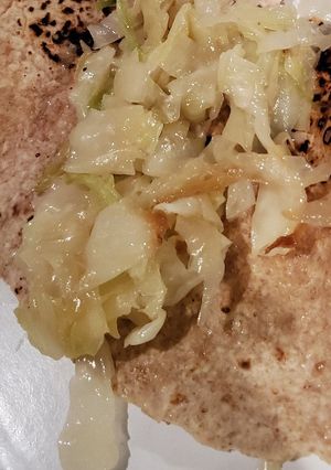Una foto de Tacos de col frita