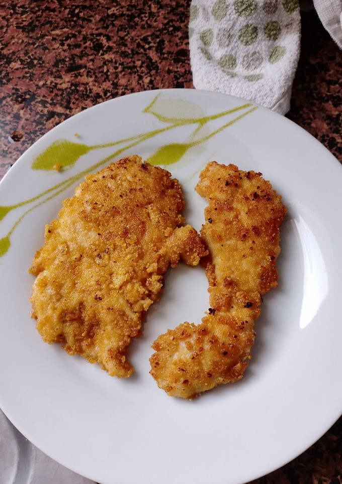 Una foto de Pechuga empanada con conos