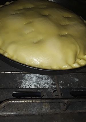 Una foto de Tarta de cebolla y queso