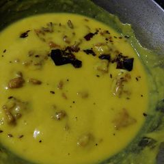 Onion pakoda Kadhi A picture of Onion pakoda Kadhi.