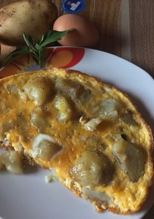 Una foto de Papas en Torta de Huevo