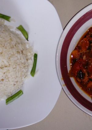 A picture of Gizzard sauce with local rice.