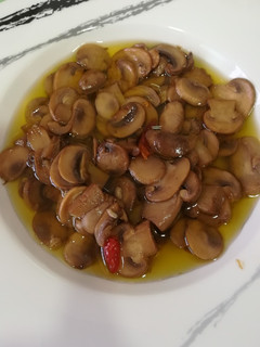 Una foto de Champiñones picantillos