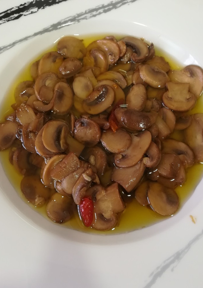 Una foto de Champiñones picantillos