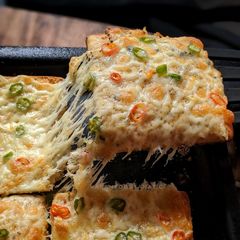 A picture of Garlic Chilli Cheese Toast.
