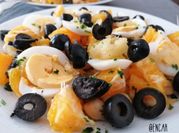 Una foto de migas de bacalao
