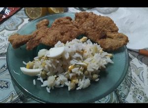 Una foto de Milanesas de pulpa de bondiola y arroz