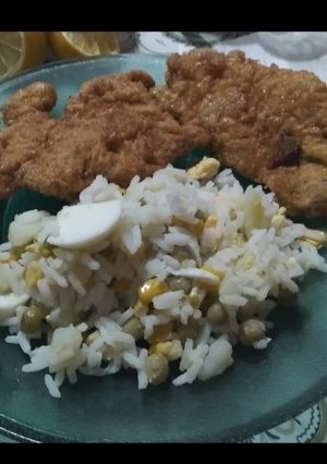 Una foto de Milanesas de pulpa de bondiola y arroz