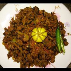 A picture of Achari Keema Karely.