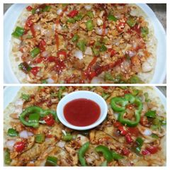 A picture of Pizza paratha 🍕🍕🍕.