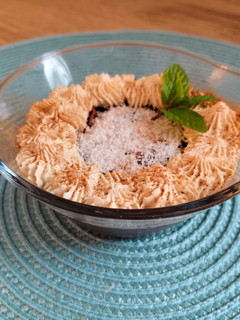 Una foto de Pudin Express de arroz con chocolate y coco (vegano)