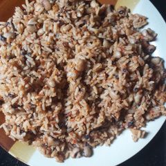 A picture of Jollof rice and beans.