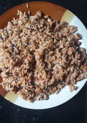 A picture of Jollof rice and beans.