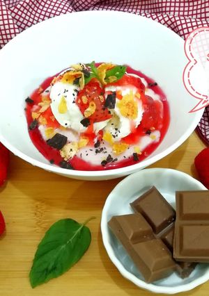 A picture of Strawberry Pudding With Frozen Yogurt And Strawberry Reduction.