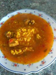 Una foto de Arroz caldoso, con magro de cerdo y costilla