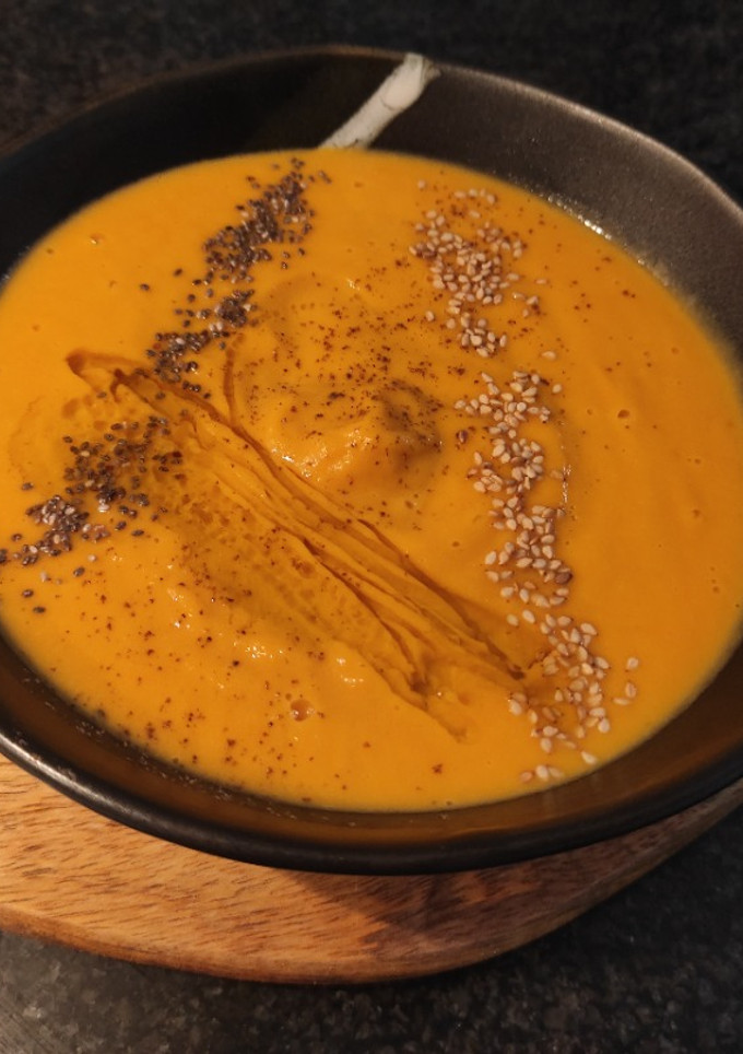 Una foto de Puré de calabaza y semillas