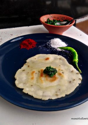 A picture of Rice flour chapati with green chutney.