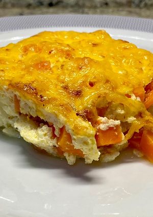 Una foto de Pastel de zanahoria y coliflor