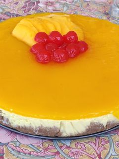 Una foto de Cheesecake de mango y chocolate blanco