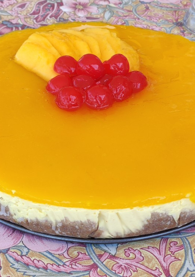 Una foto de Cheesecake de mango y chocolate blanco