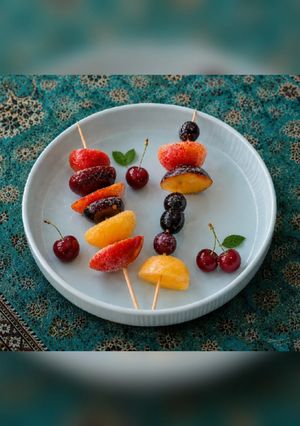 عکسی از دستور میوه آب‌نباتی یخی(تانگلو یا میوه شیشه ای)
