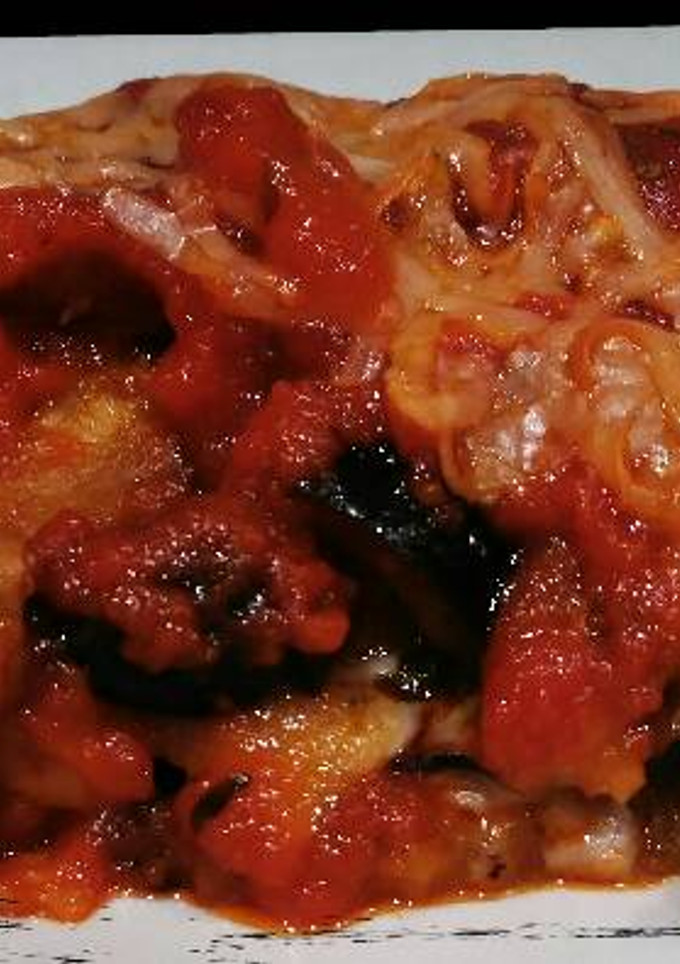 Una foto de Berenjenas al horno con orégano y mozzarella