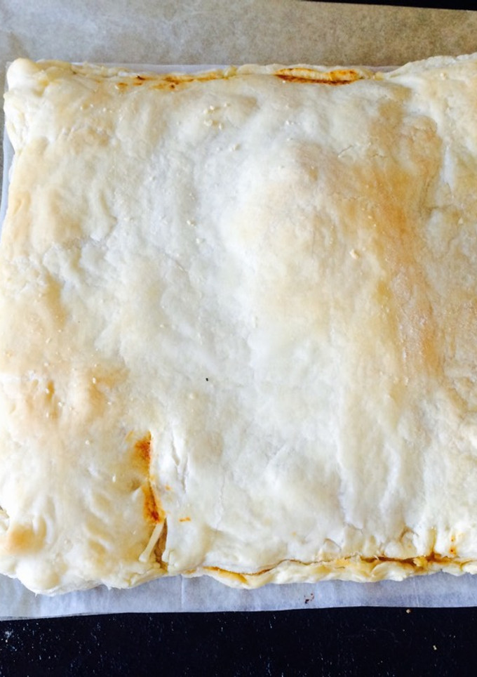 Una foto de Empanada de pollo al curry