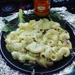 A picture of Chinese salad with cheese and minced chicken.