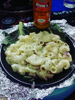 A picture of Chinese salad with cheese and minced chicken.