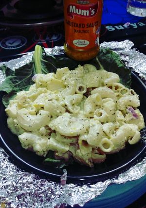 A picture of Chinese salad with cheese and minced chicken.