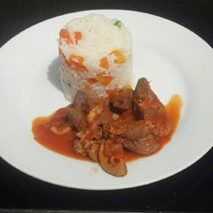 White rice with offals stew A picture of White rice with offals stew.