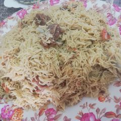 A picture of Mutton yaqni pulao.