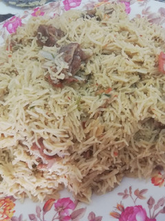 A picture of Mutton yaqni pulao.