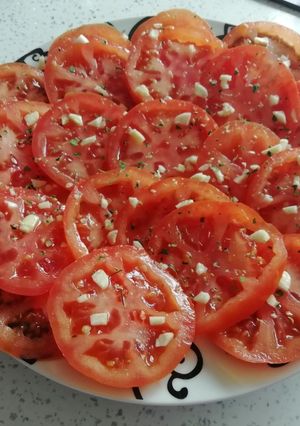 Una foto de Tomate con aceite y ajo