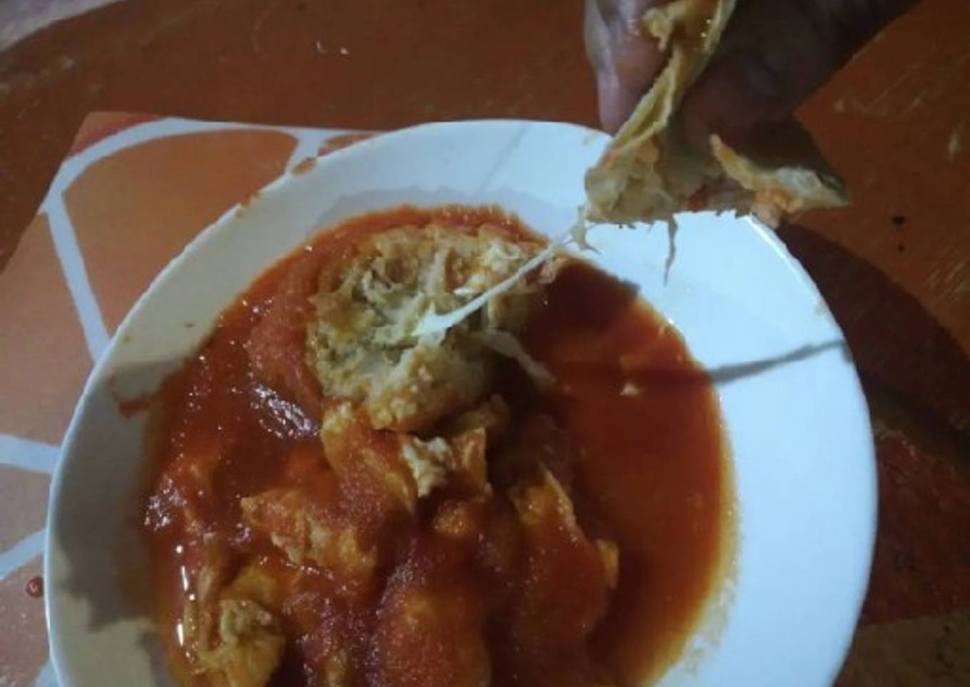 Coliflor capeada en caldillo de jitomate