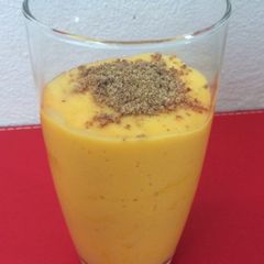 A picture of Mango Peach Smoothie With Grounded Flax seeds.