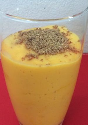 A picture of Mango Peach Smoothie With Grounded Flax seeds.