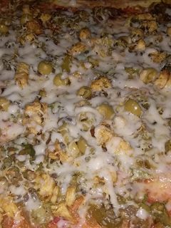 صورة لوصفة بيتزا بعجينة الزرع