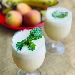 A picture of Peach and banana milkshake.