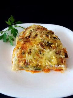 Una foto de Lasaña de calabacín y pollo con bechamel de coliflor